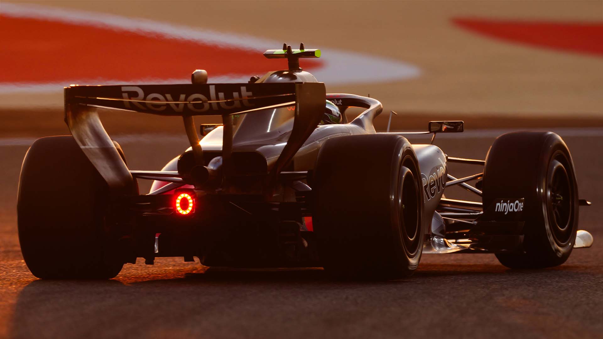 A picture showing the Audi R26 on the race track in Bahrain.