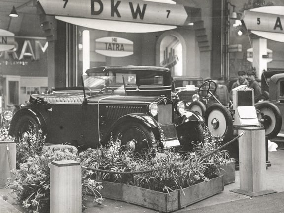 Black and white photo of a DKW Front F 1 at a trade fair