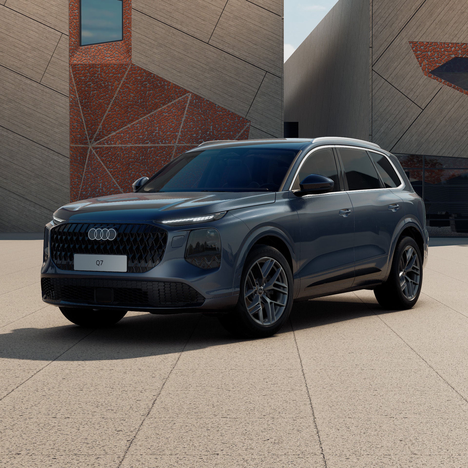 Ein Audi Q7 SUV in Alopiasblau Metallic schräg von vorne fotografiert vor einer futuristischen Kulisse
