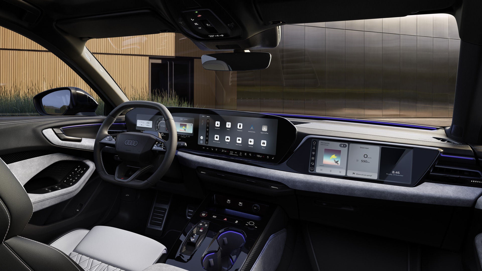 View from the passenger seat into the cockpit of the S5 Sedan. The displays, purple ambient lighting, and customized interior features are visible.  