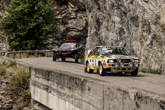 The Audi RS Q e-tron drives up the Col de Turini behind the Audi Sport quattro S1.