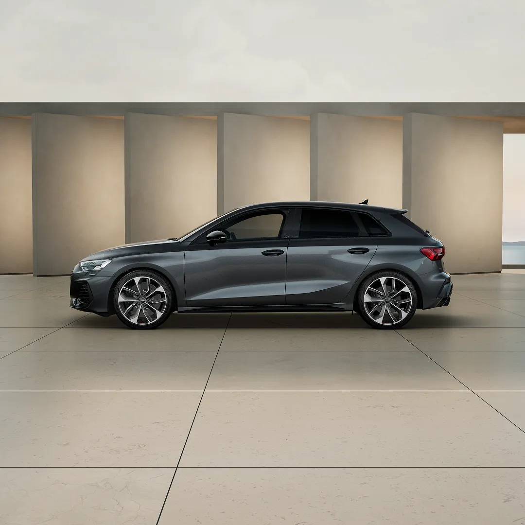 S3 Sportback parked near tile beige wall