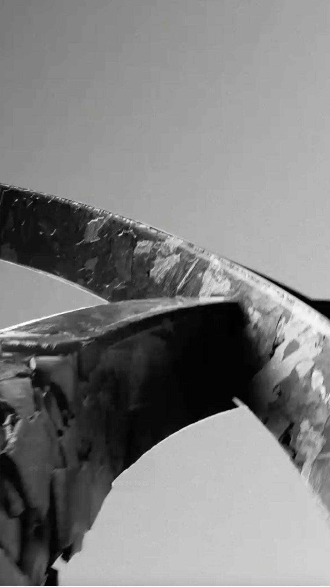 A grey partial image of the Audi logo