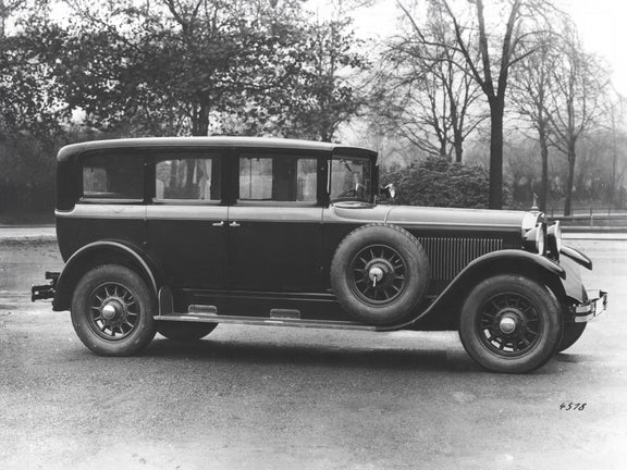 Black and white photo of the Audi Type R Imperator in front of trees in a park