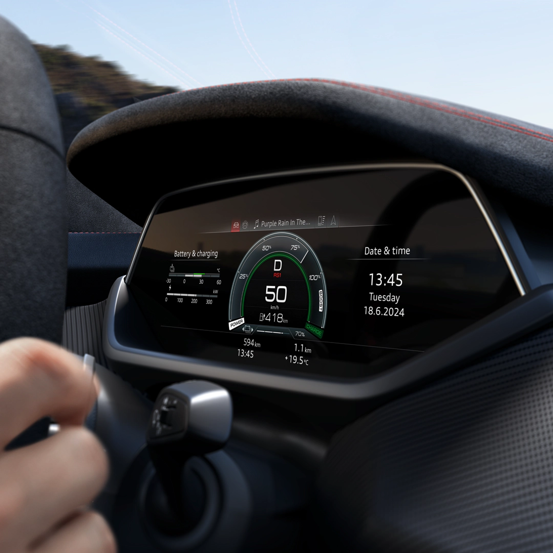 Car dashboard with digital display showing speed, battery level, and date.