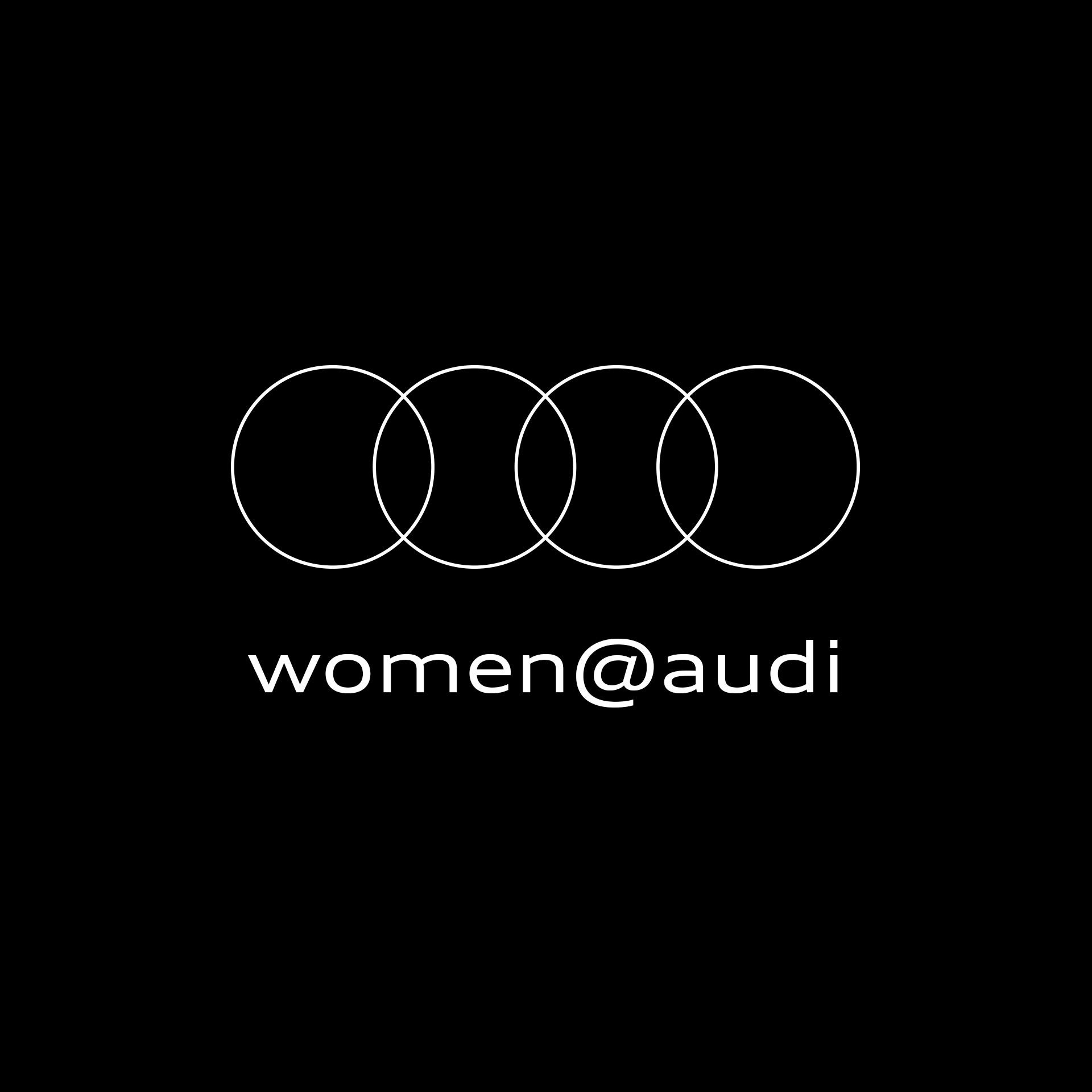 Audi Logo mit einem Schriftzug woman@audi darunter