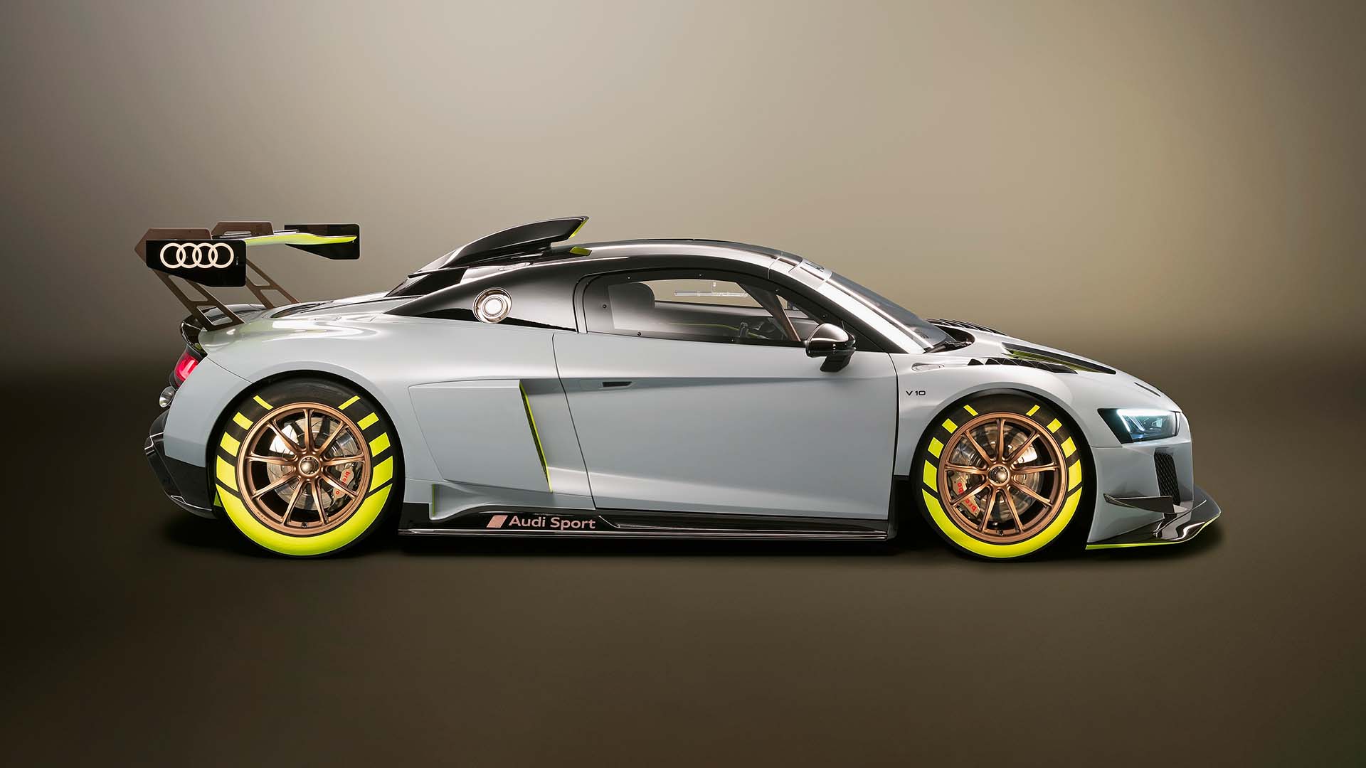A picture showing the Audi R8 LMS GT2 race car on display.