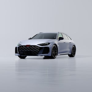 Three-quarter front view of the Audi RS 5 Avant in the special Singapore paint finish.