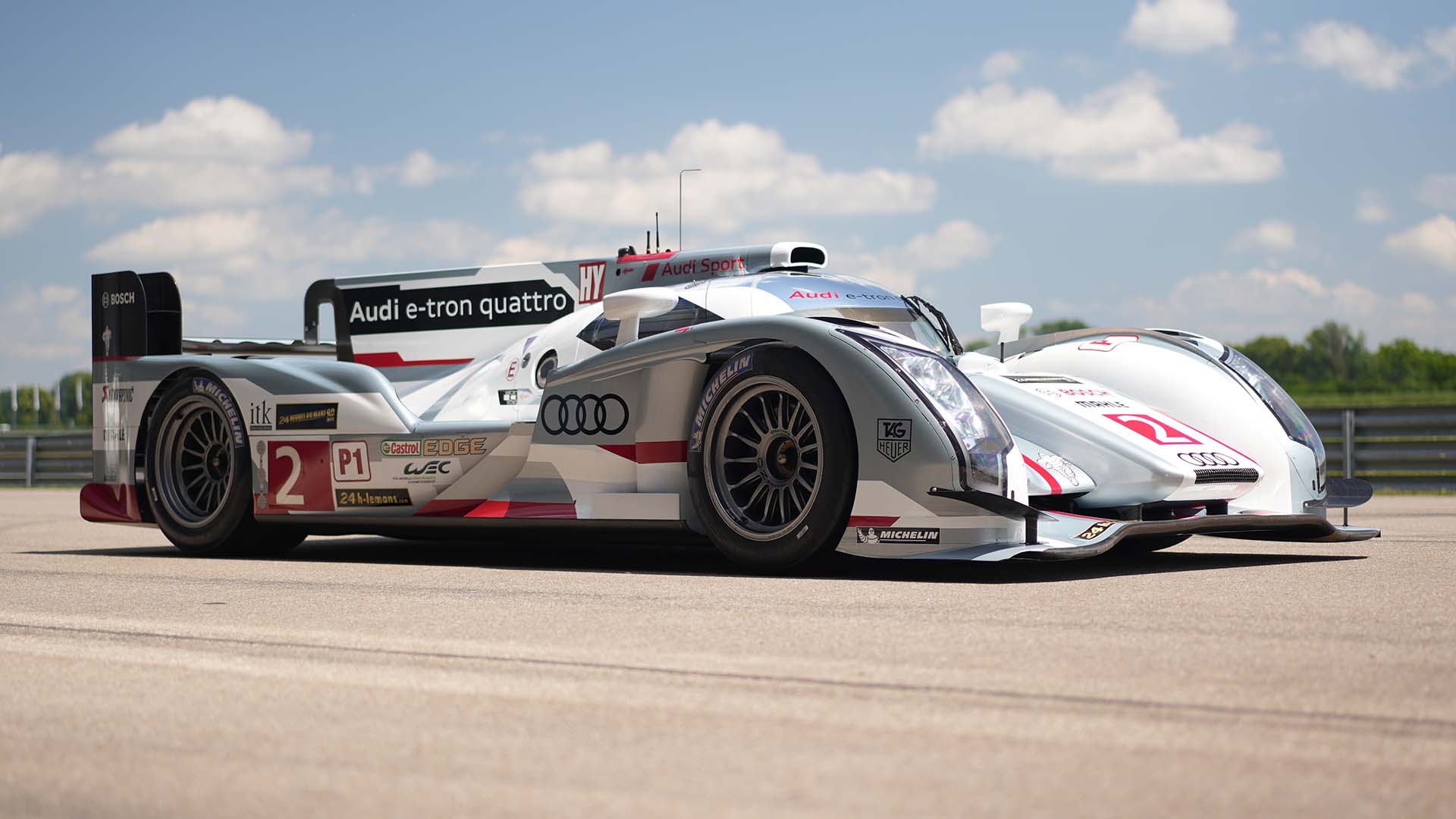 A picture showing an Audi R18 e-tron quattro race car on display in Neuburg.