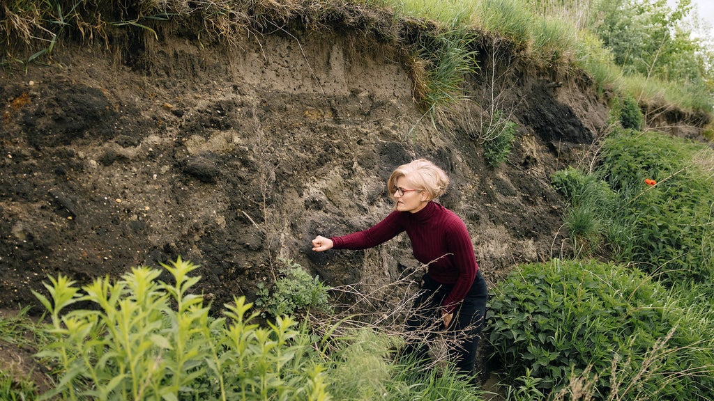 Antje Arnold touches earth on a slope
