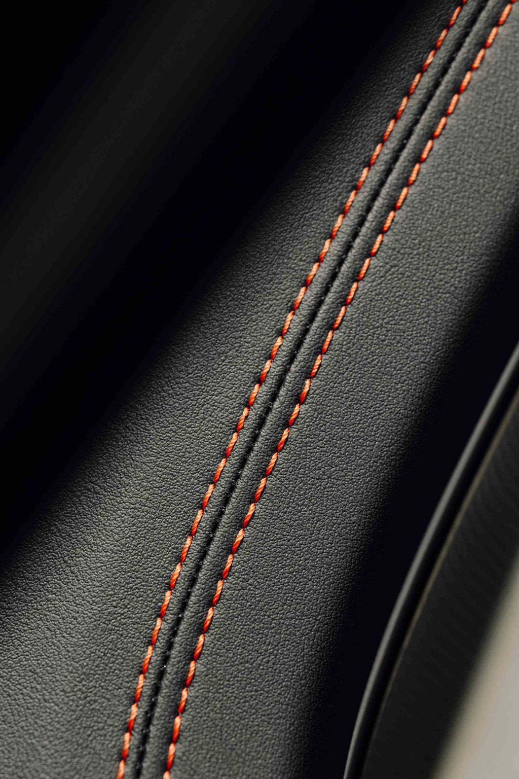 Contrast stitching in Bright Orange.