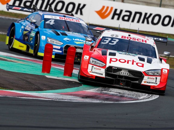 A picture showing René Rast’s Audi RS 5 DTM race car on track at Zolder in 2020.