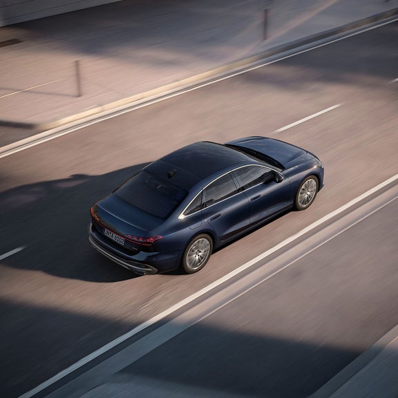 Aerial shot of an Audi A6 Saloon driving on the road