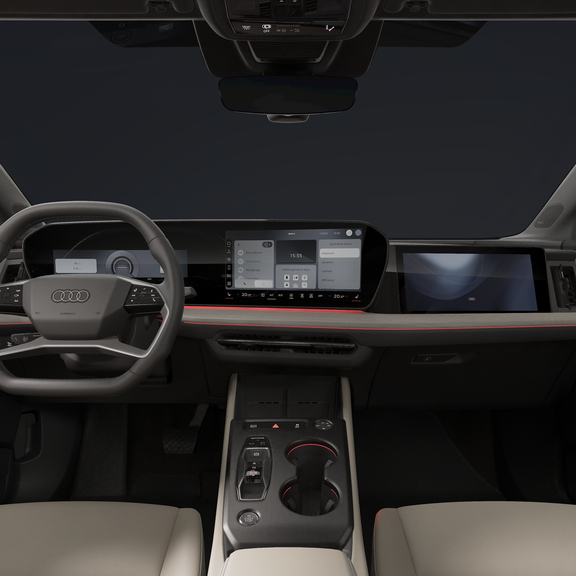 Nahaufnahme des Cockpits mit Fokus auf das abgeflachte Lenkrad, das geschwungene Panoramadisplay und das Beifahrerdisplay.