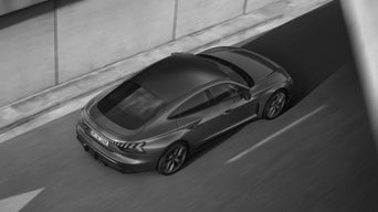 View from above of an Audi car driving on the road