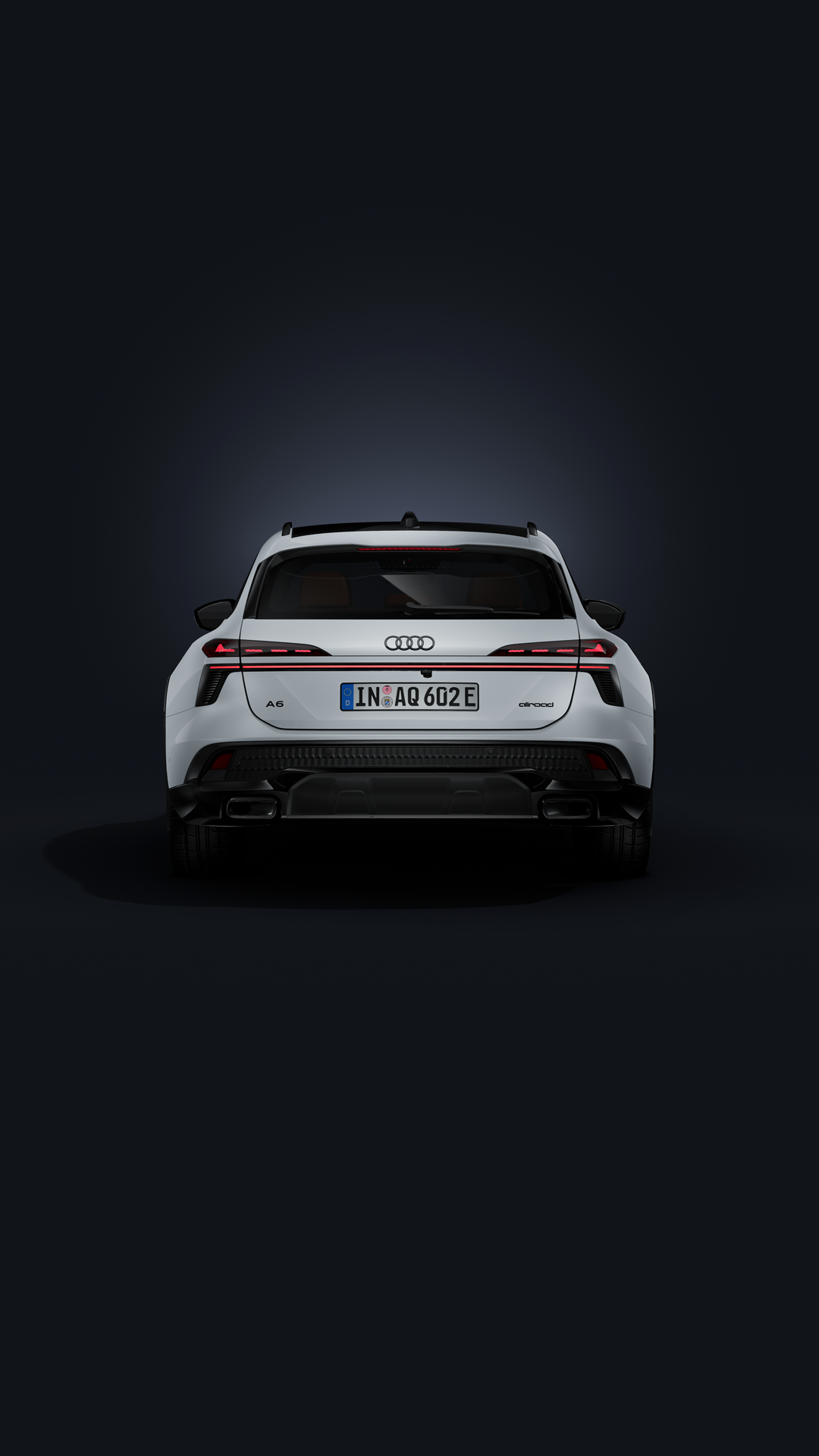 The Audi A6 allroad e-hybrid, viewed from the side against a dark background.