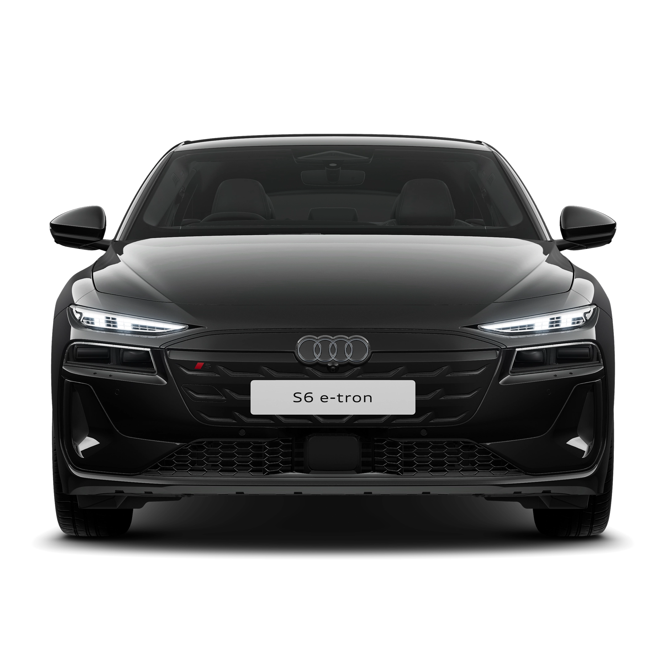 Front profile of the S6 Avant e-tron, standing on paving stones in front of a modern building.