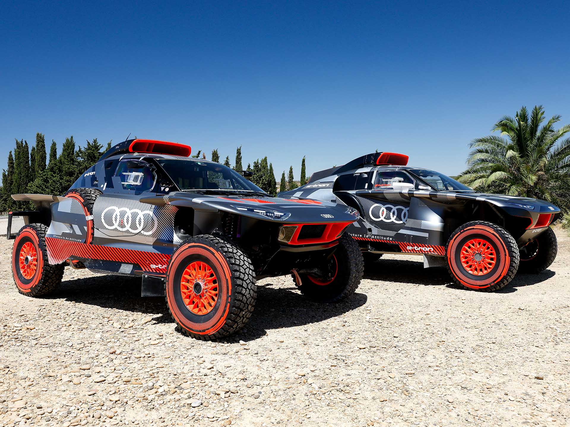 A press picture showing the first- and second-generation Audi RS Q e-tron cars.