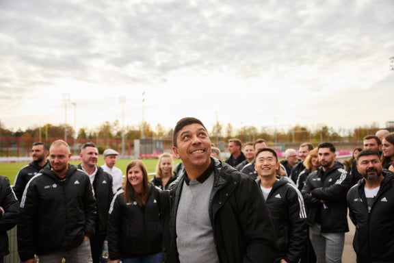 Team Audi in front of the training ground of FC Bayern