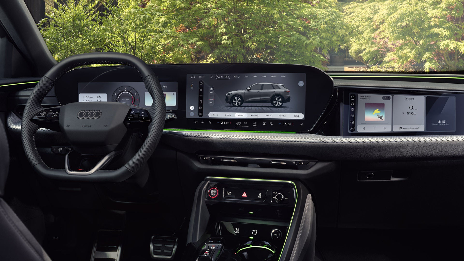 Blick von der Rückbank in das Cockpit des Q5 SUV. Im Fokus steht das Panoramadisplay mit dem Audi Virtual Cockpit und dem MMI Display. 	