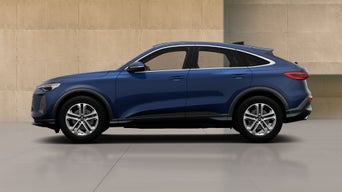 A blue Audi Q5 Sportback e with modern design elements, showcasing its profile against a minimalist concrete backdrop. 