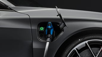 Illustration of an electricity bolt in blue colour on a black background