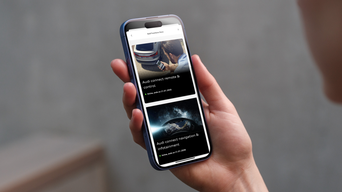 A person holds a smartphone displaying Audi connect features: remote control and navigation, with subscription details visible.
