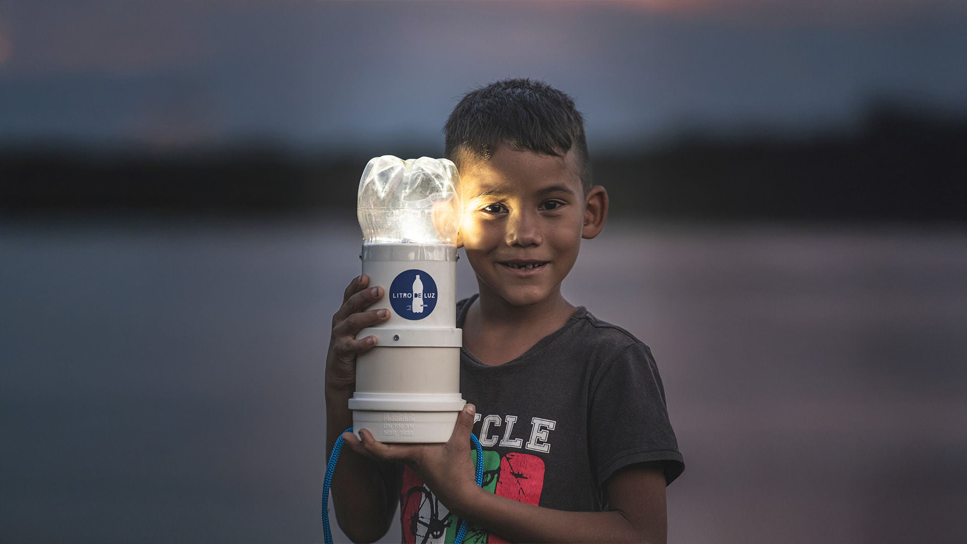 Young boy with solar light source.