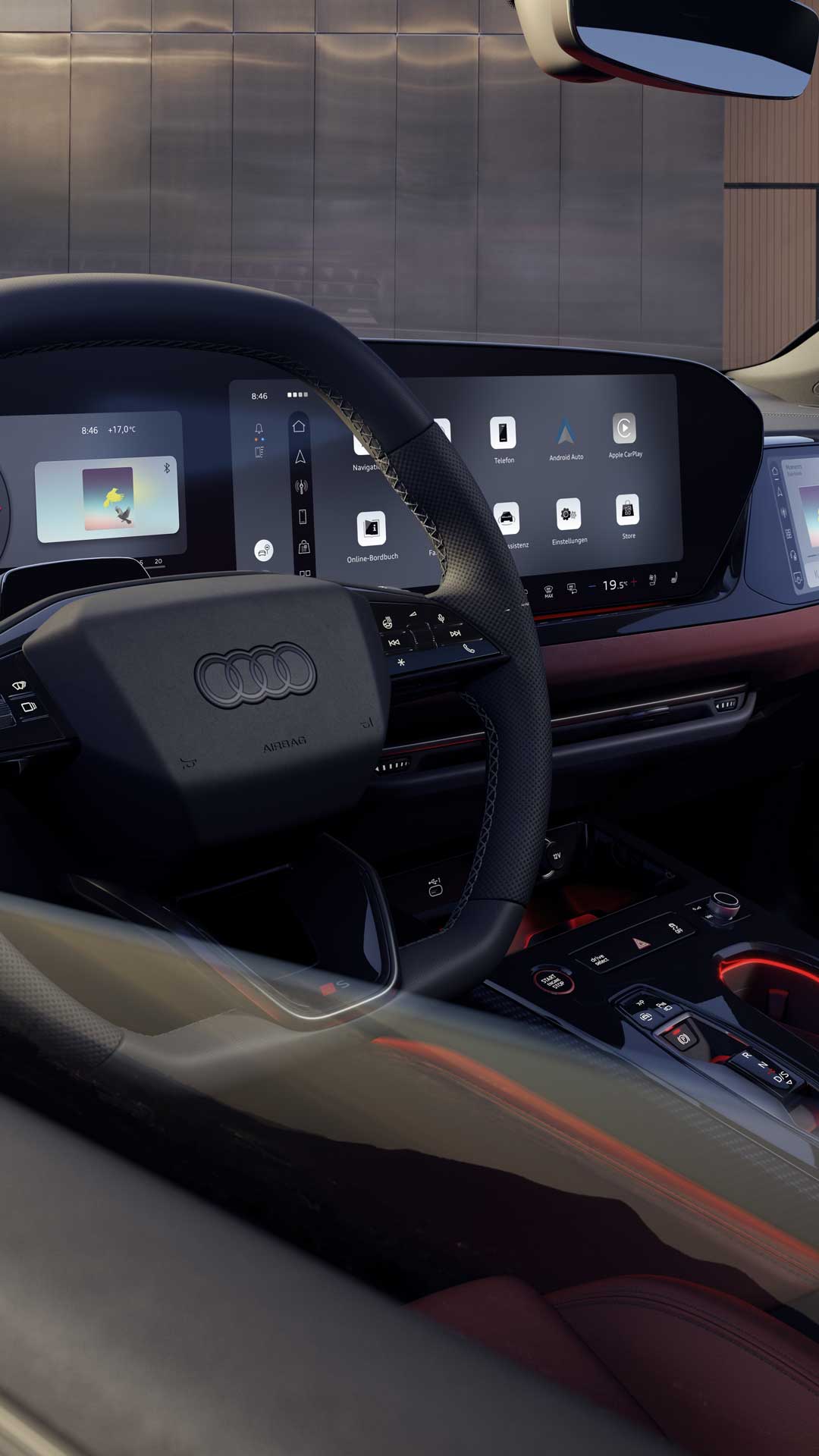 Innenraum und Cockpit des S5 Avant aus der Perspektive des Fahrerfensters. Der Innenraum leuchtet in rotem Ambiente Licht. 