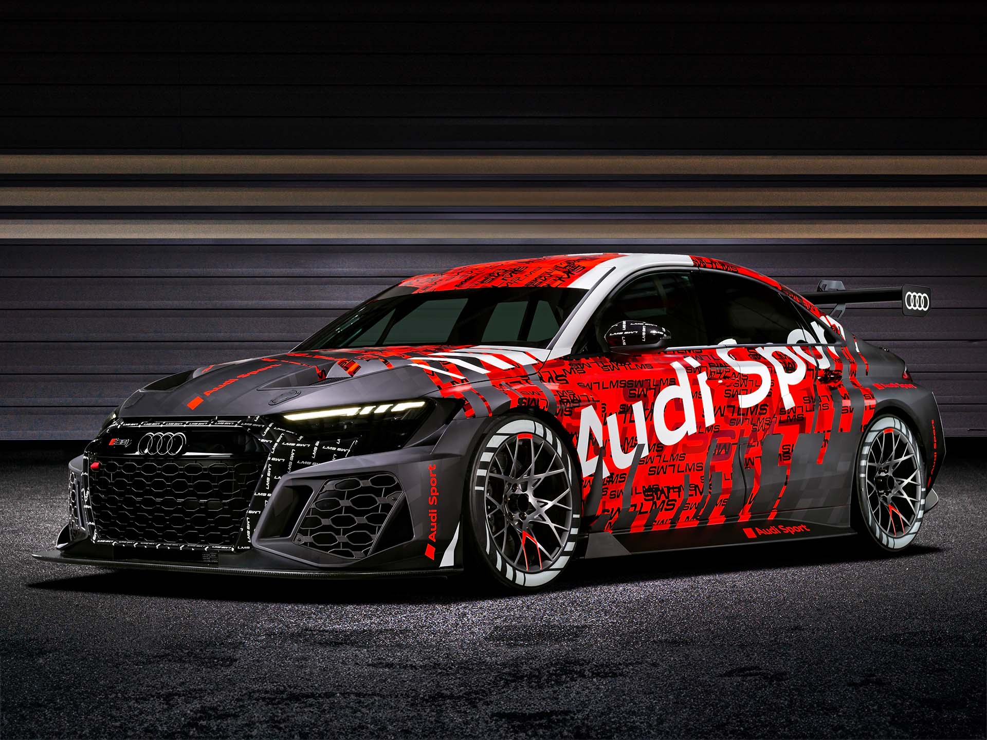 A picture showing the Audi RS 3 LMS race car on display.