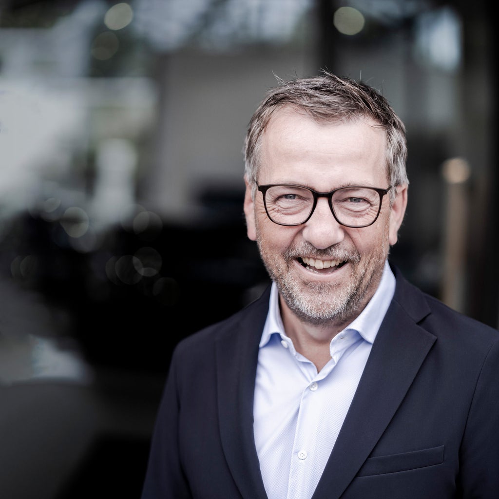 Michael Agsteiner laughs into the camera