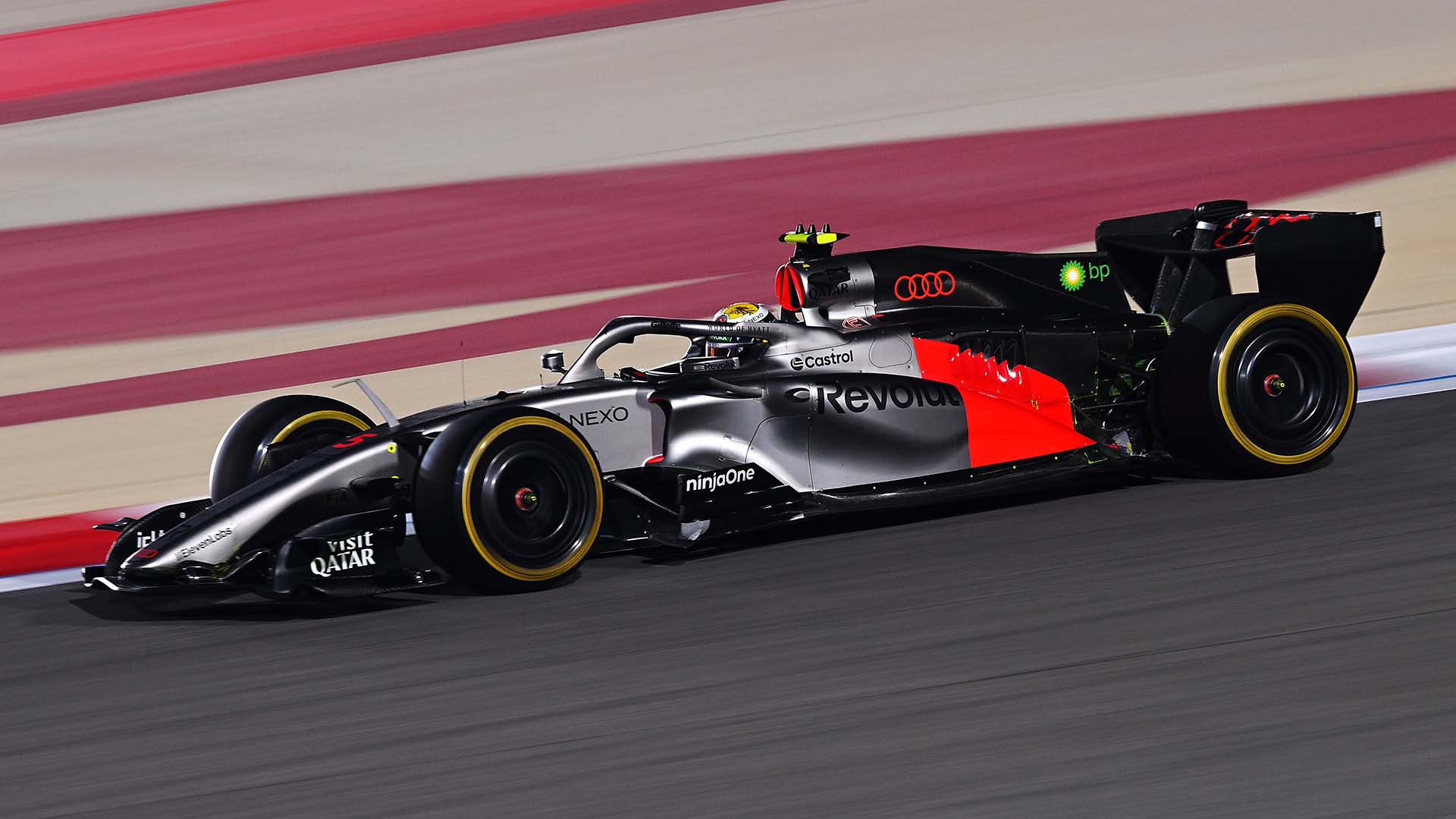 A picture showing the Audi R26 on the race track in Bahrain.
