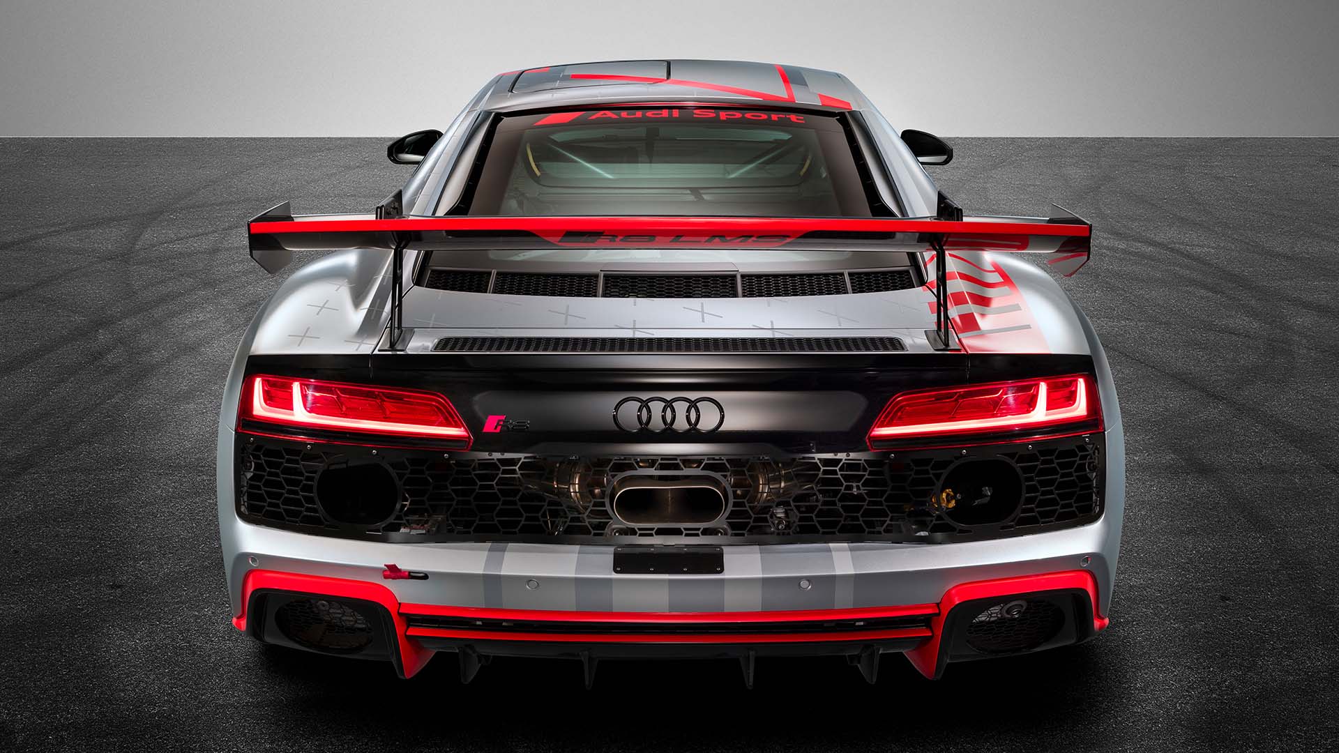 A picture showing the Audi R8 LMS GT4 race car on display.