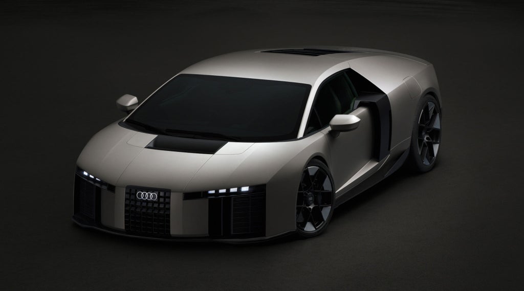 Front three-quarter view of the Audi Nuvolari, highlighting its low-slung stance, distinctive light signature and sculpted bodywork.