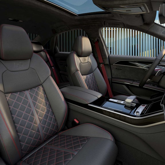 Interior view of the S8 with red decorative stitching on the seats and red details 