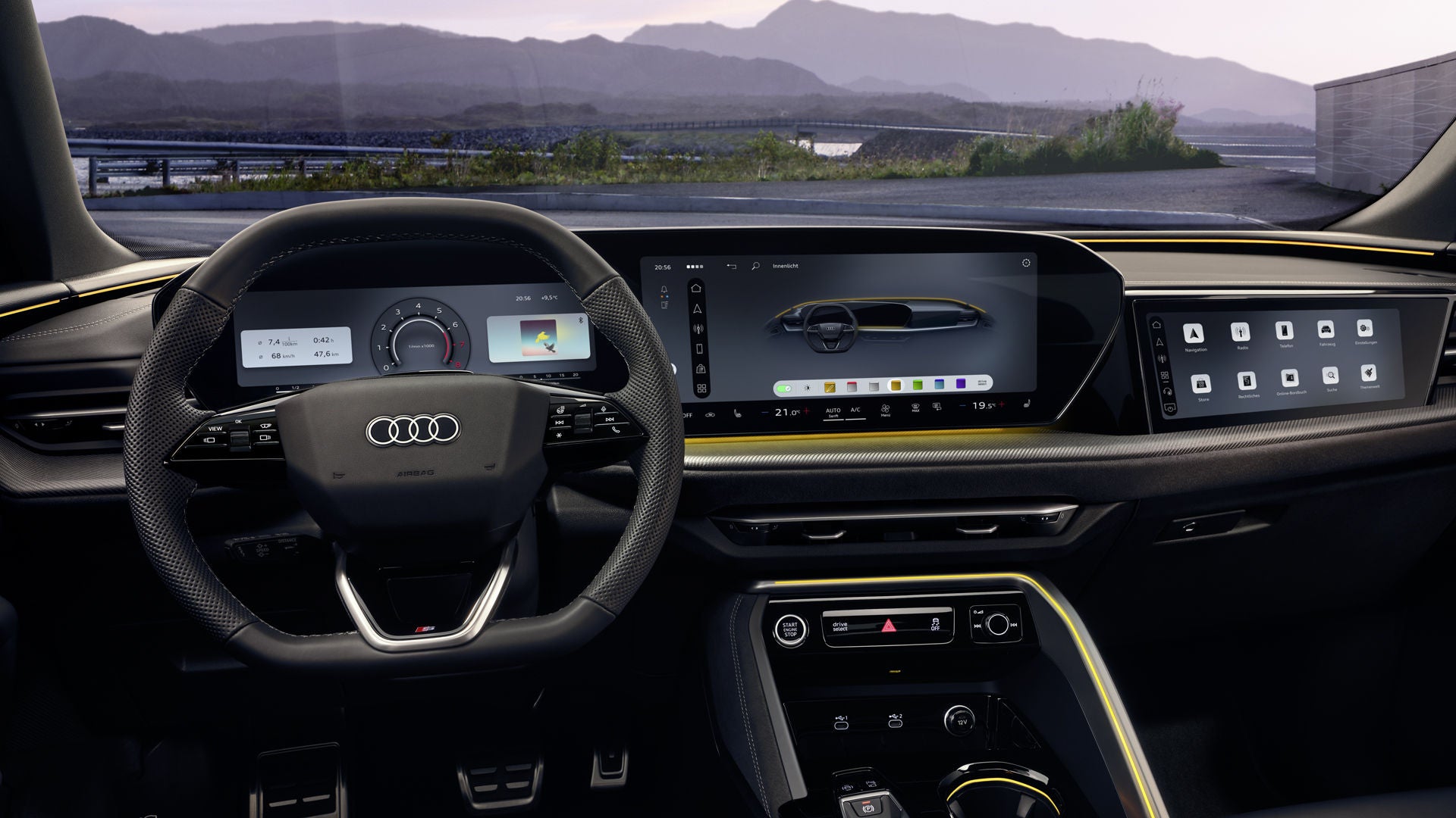 Blick in das Cockpit des Q5 Sportback aus Sicht des Fahrers. Zu sehen sind unter anderem das MMI touch-Display und das Audi virtual Cockpit hinter dem Lenkrad.