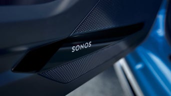 Close-up of Audi A1 Sportback car door speaker grille with the "SONOS" logo.
