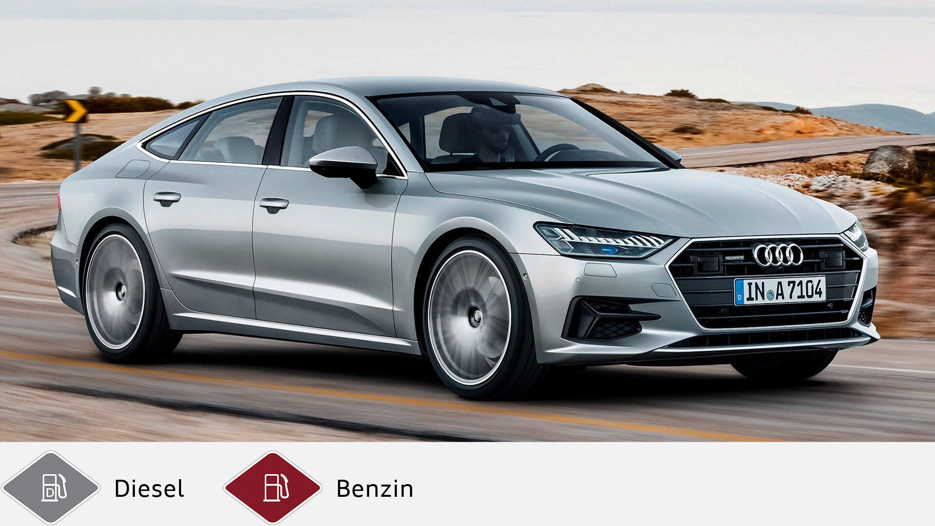 Silberner Audi A7 Sportback fährt auf kurviger Straße mit Landschaft im Hintergrund. Unten graues Dieselsymbol und rotes Benzinsymbol.