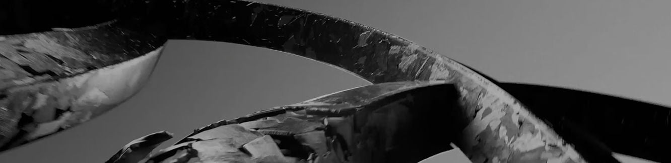 A red and black Audi F1 race car on a futuristic track with dynamic lighting