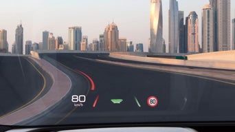 Heads up display of an Audi car showing digital numbers
