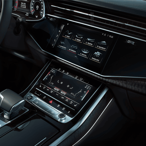 Close-up view of the dashboard and centre console of Audi Q8 tfsi e.