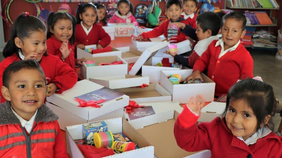 Audi employees donate everyday items for people in need.