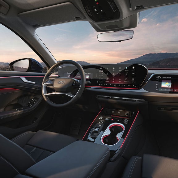 Interior of an Audi car with emphasis to it's digital components