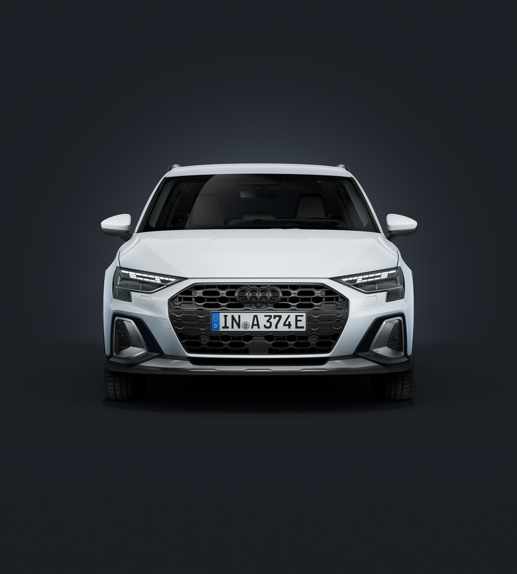 Der Audi A3 allstreet e-hybrid frontal von vorn auf dunklem Hintergrund.