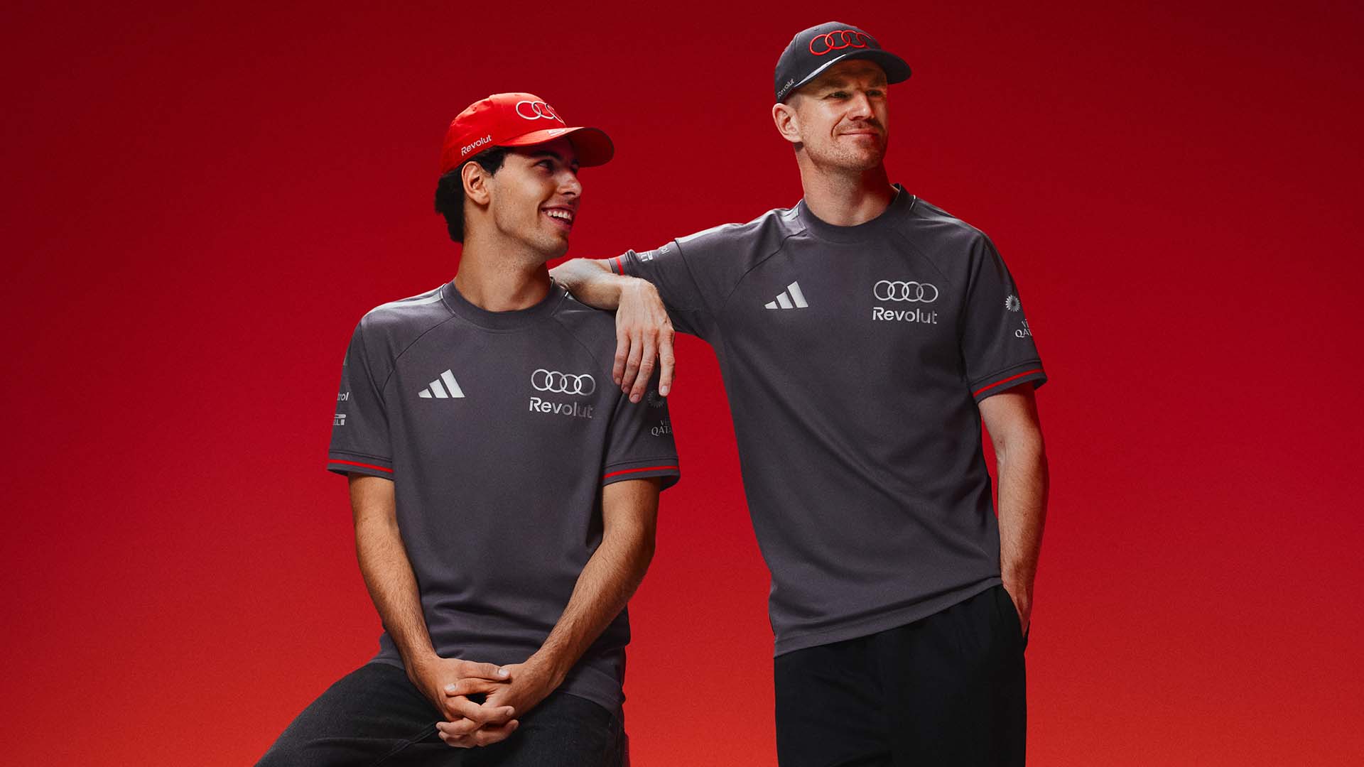 A picture showing Gabriel Bortoleto and Nico Hulkenberg wearing clothing from the team’s collection from adidas.