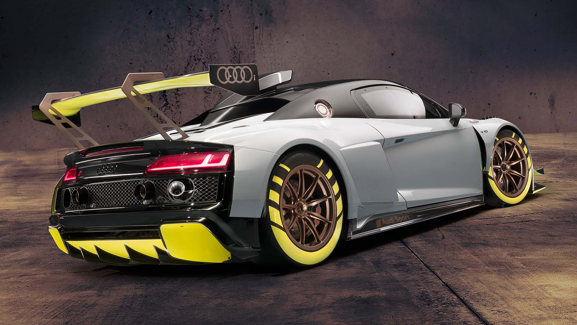 A picture showing the Audi R8 LMS GT2 race car on display.