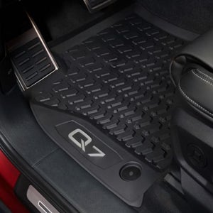The step of an Audi car with the logo of Q7 engraved