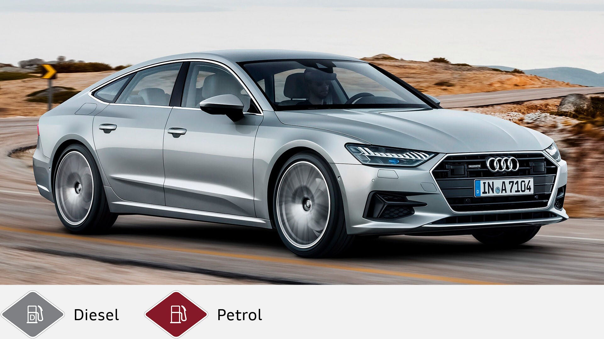 Silver Audi A7 Sportback driving on a winding road with landscape in the background. Gray diesel symbol and red petrol symbol at the bottom.