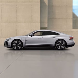 Left side of a white RS e-tron GT performance Audi vehicle