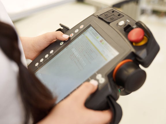 Isabella shows an Audi device